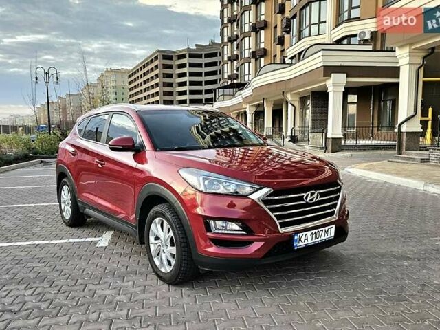Красный Хендай Туксон, объемом двигателя 2 л и пробегом 94 тыс. км за 19500 $, фото 8 на Automoto.ua