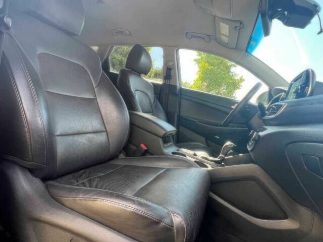 Червоний Хендай Туксон, об'ємом двигуна 2.4 л та пробігом 46 тис. км за 6400 $, фото 9 на Automoto.ua