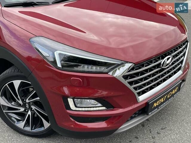 Красный Хендай Туксон, объемом двигателя 2 л и пробегом 64 тыс. км за 30500 $, фото 3 на Automoto.ua