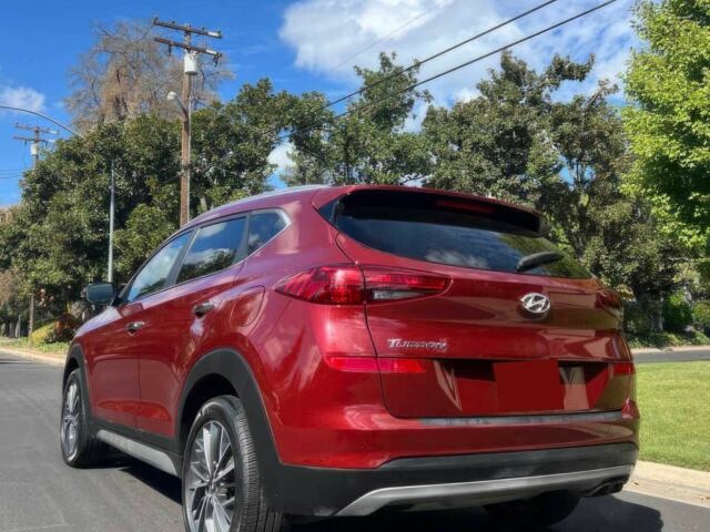 Червоний Хендай Туксон, об'ємом двигуна 2.4 л та пробігом 46 тис. км за 6400 $, фото 7 на Automoto.ua