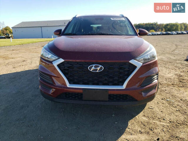 Красный Хендай Туксон, объемом двигателя 2 л и пробегом 71 тыс. км за 13300 $, фото 4 на Automoto.ua