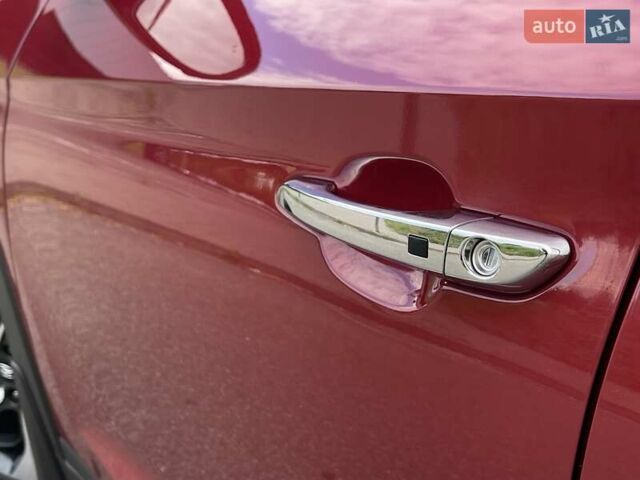 Красный Хендай Туксон, объемом двигателя 2 л и пробегом 64 тыс. км за 30500 $, фото 39 на Automoto.ua