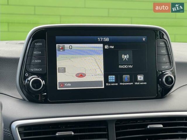 Красный Хендай Туксон, объемом двигателя 2 л и пробегом 64 тыс. км за 30500 $, фото 21 на Automoto.ua