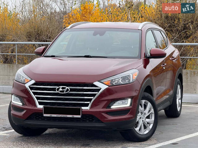 Красный Хендай Туксон, объемом двигателя 0 л и пробегом 175 тыс. км за 18900 $, фото 4 на Automoto.ua