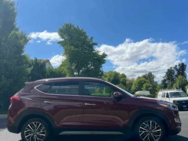 Червоний Хендай Туксон, об'ємом двигуна 2.4 л та пробігом 46 тис. км за 6400 $, фото 3 на Automoto.ua