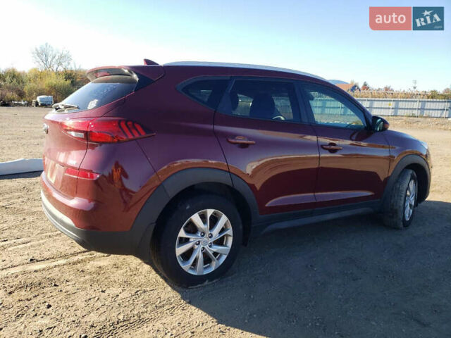 Красный Хендай Туксон, объемом двигателя 2 л и пробегом 71 тыс. км за 13300 $, фото 2 на Automoto.ua