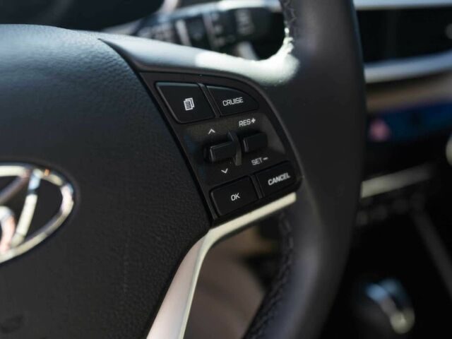 Красный Хендай Туксон, объемом двигателя 2 л и пробегом 45 тыс. км за 14000 $, фото 9 на Automoto.ua