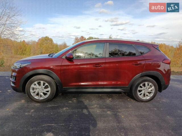 Красный Хендай Туксон, объемом двигателя 2 л и пробегом 97 тыс. км за 20000 $, фото 7 на Automoto.ua