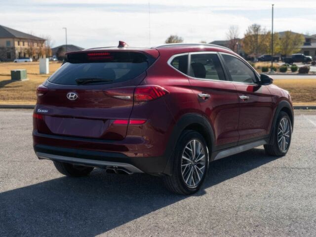 Красный Хендай Туксон, объемом двигателя 2 л и пробегом 45 тыс. км за 14000 $, фото 5 на Automoto.ua