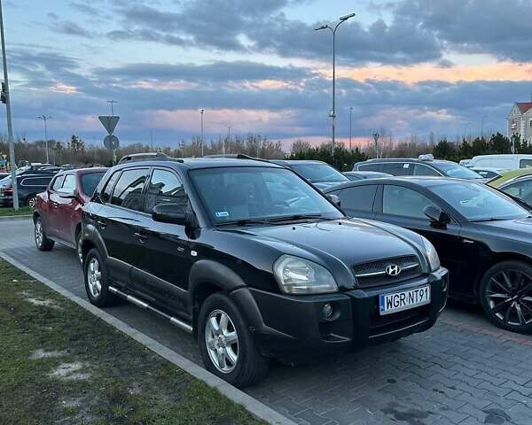 Хендай Туксон, объемом двигателя 2 л и пробегом 150 тыс. км за 5800 $, фото 4 на Automoto.ua