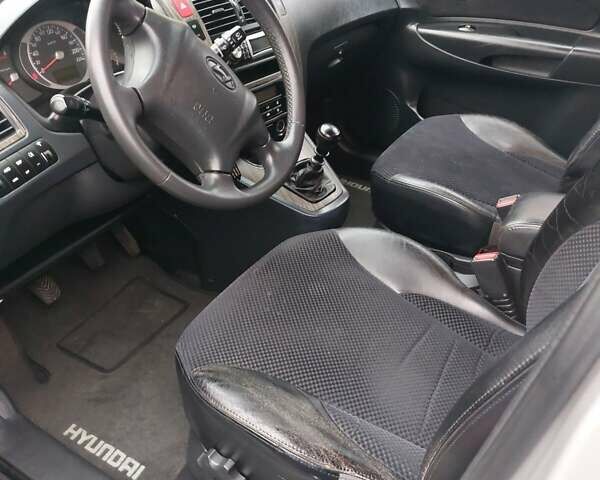 Хендай Туксон, объемом двигателя 2 л и пробегом 350 тыс. км за 8000 $, фото 5 на Automoto.ua