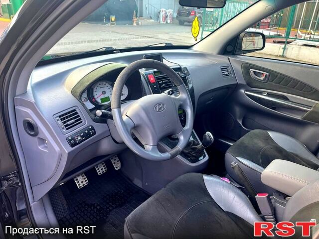 Хендай Туксон, об'ємом двигуна 2 л та пробігом 173 тис. км за 8000 $, фото 8 на Automoto.ua