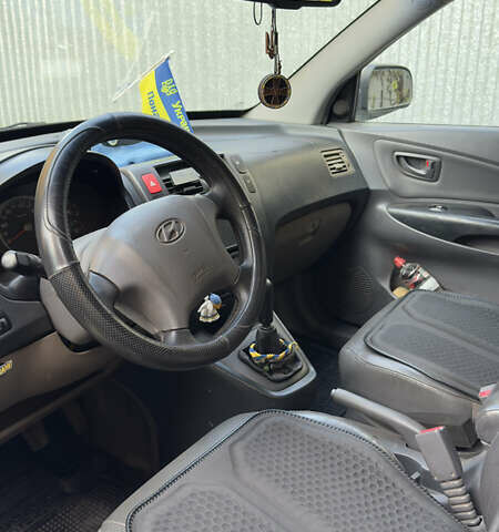 Хендай Туксон, объемом двигателя 2 л и пробегом 208 тыс. км за 6700 $, фото 10 на Automoto.ua