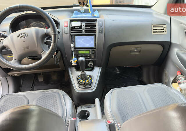 Хендай Туксон, объемом двигателя 2 л и пробегом 208 тыс. км за 6700 $, фото 8 на Automoto.ua