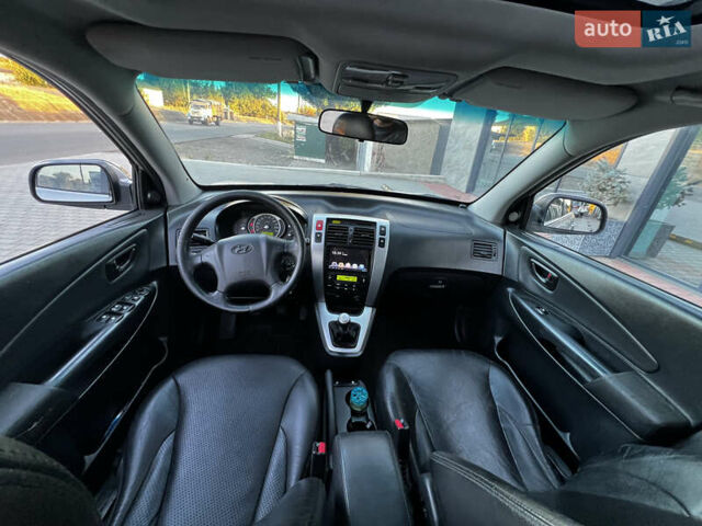Хендай Туксон, объемом двигателя 2 л и пробегом 360 тыс. км за 6900 $, фото 27 на Automoto.ua