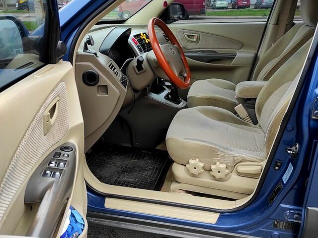 Хендай Туксон, объемом двигателя 2 л и пробегом 225 тыс. км за 7300 $, фото 7 на Automoto.ua