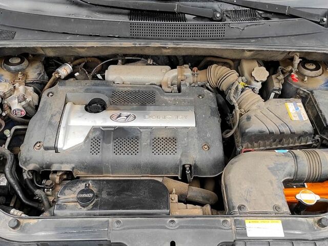 Хендай Туксон, объемом двигателя 2 л и пробегом 225 тыс. км за 7300 $, фото 10 на Automoto.ua