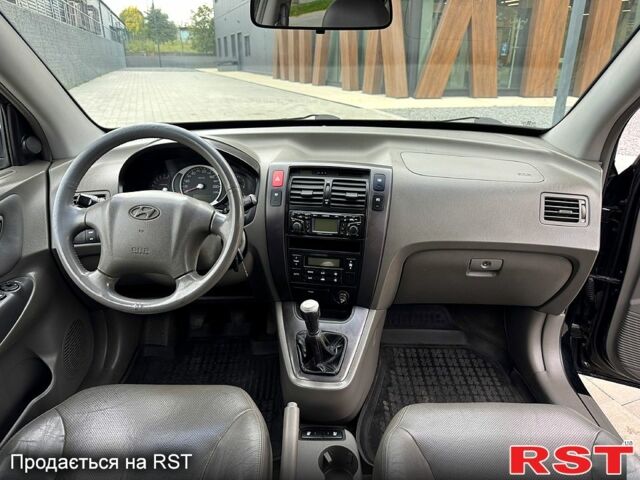 Хендай Туксон, объемом двигателя 2 л и пробегом 235 тыс. км за 7450 $, фото 8 на Automoto.ua