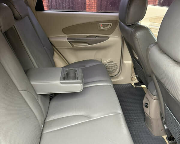 Хендай Туксон, объемом двигателя 2 л и пробегом 248 тыс. км за 7300 $, фото 12 на Automoto.ua