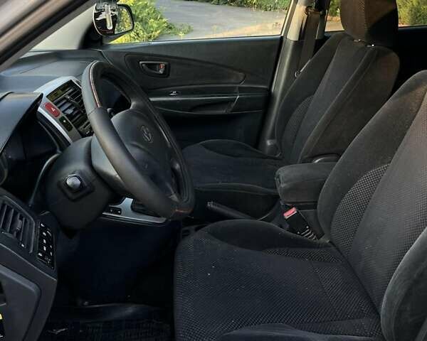 Хендай Туксон, объемом двигателя 2 л и пробегом 280 тыс. км за 7300 $, фото 10 на Automoto.ua