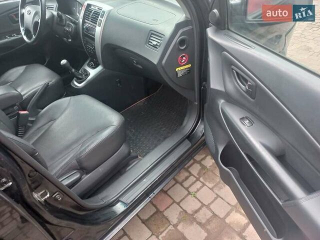 Хендай Туксон, объемом двигателя 2 л и пробегом 194 тыс. км за 6800 $, фото 23 на Automoto.ua