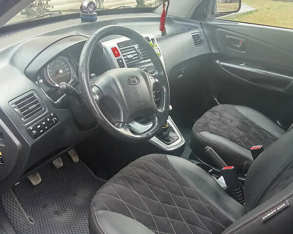 Хендай Туксон, объемом двигателя 2 л и пробегом 291 тыс. км за 8700 $, фото 8 на Automoto.ua