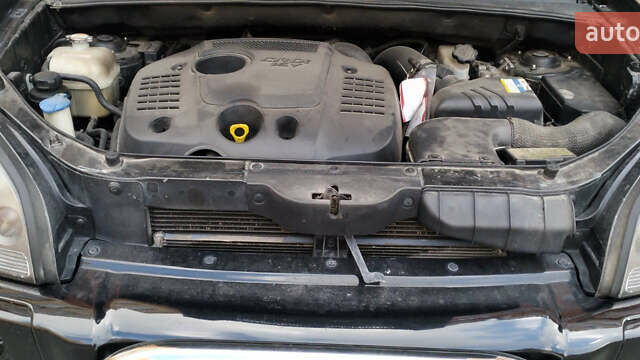 Хендай Туксон, объемом двигателя 1.99 л и пробегом 292 тыс. км за 8500 $, фото 13 на Automoto.ua