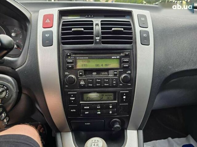 Хендай Туксон, объемом двигателя 2 л и пробегом 250 тыс. км за 6900 $, фото 14 на Automoto.ua