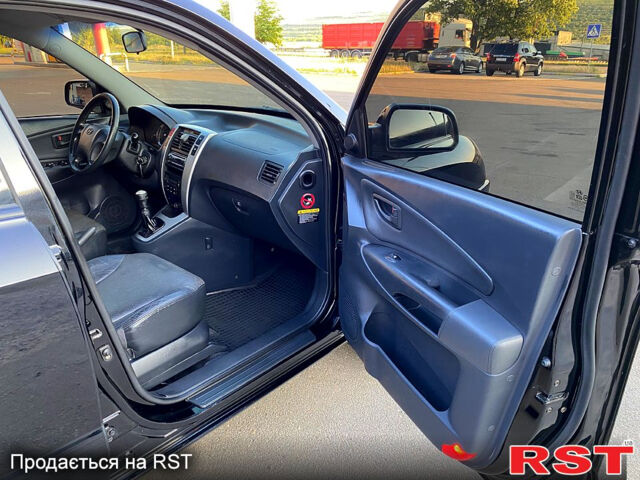 Хендай Туксон, объемом двигателя 2 л и пробегом 179 тыс. км за 7800 $, фото 11 на Automoto.ua