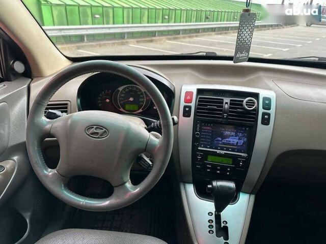 Хендай Туксон, объемом двигателя 2 л и пробегом 214 тыс. км за 7490 $, фото 13 на Automoto.ua