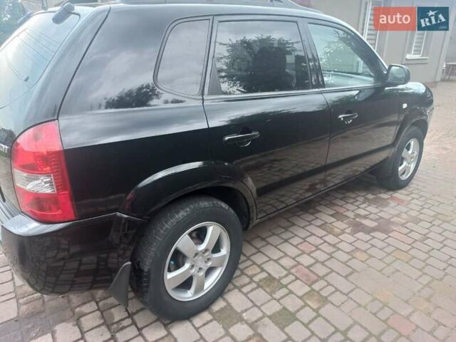 Хендай Туксон, объемом двигателя 2 л и пробегом 194 тыс. км за 6800 $, фото 10 на Automoto.ua