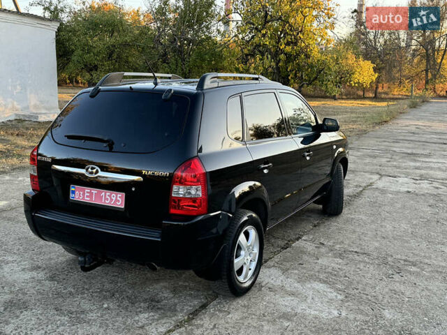 Хендай Туксон, объемом двигателя 2 л и пробегом 245 тыс. км за 7900 $, фото 9 на Automoto.ua