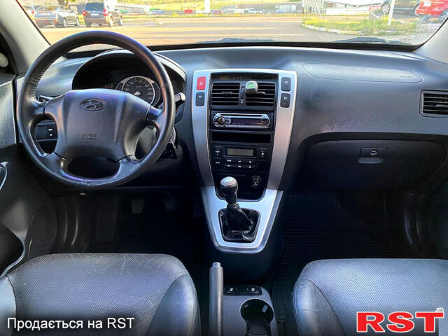 Хендай Туксон, объемом двигателя 2 л и пробегом 179 тыс. км за 7800 $, фото 9 на Automoto.ua