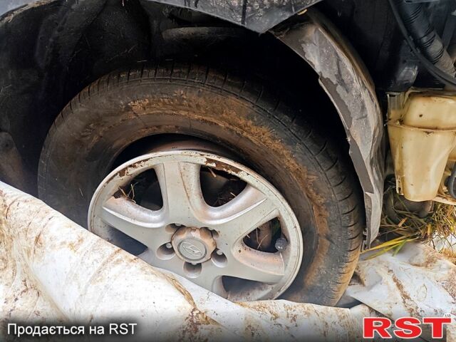 Хендай Туксон 2007 у Ромнах на Automoto.ua Хендай Туксон, об'ємом двигуна 2 л та пробігом 257 тис. км за 1999 $, фото 10 на Automoto.ua