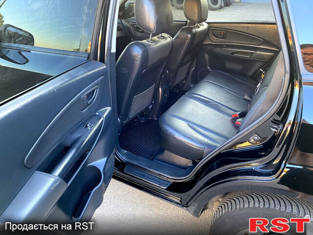 Хендай Туксон, объемом двигателя 2 л и пробегом 179 тыс. км за 7800 $, фото 12 на Automoto.ua