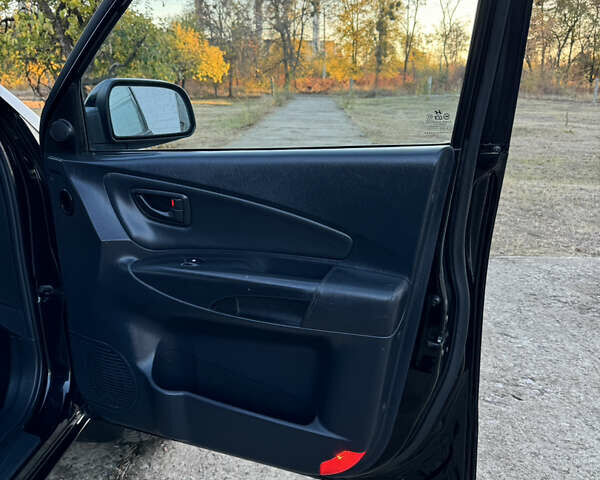 Хендай Туксон, объемом двигателя 2 л и пробегом 245 тыс. км за 7900 $, фото 42 на Automoto.ua