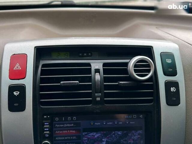 Хендай Туксон, объемом двигателя 2 л и пробегом 214 тыс. км за 7490 $, фото 21 на Automoto.ua