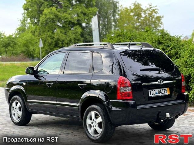 Хендай Туксон, объемом двигателя 2 л и пробегом 144 тыс. км за 7600 $, фото 2 на Automoto.ua