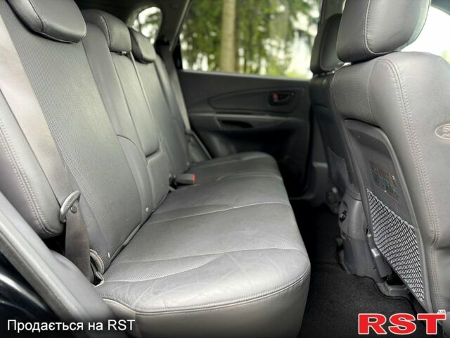 Хендай Туксон, объемом двигателя 2 л и пробегом 144 тыс. км за 7600 $, фото 5 на Automoto.ua