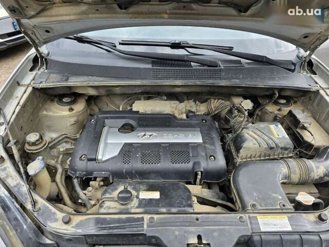 Хендай Туксон, объемом двигателя 2 л и пробегом 250 тыс. км за 6900 $, фото 21 на Automoto.ua