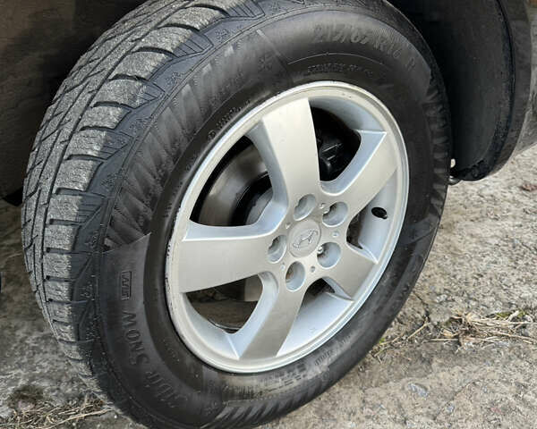 Хендай Туксон, объемом двигателя 2 л и пробегом 245 тыс. км за 7900 $, фото 26 на Automoto.ua