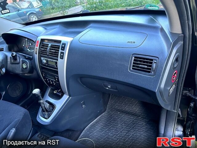 Хендай Туксон, об'ємом двигуна 2 л та пробігом 197 тис. км за 8700 $, фото 6 на Automoto.ua