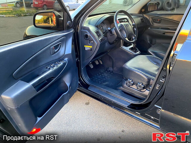 Хендай Туксон, объемом двигателя 2 л и пробегом 179 тыс. км за 7800 $, фото 10 на Automoto.ua