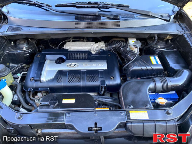 Хендай Туксон, объемом двигателя 2 л и пробегом 179 тыс. км за 7800 $, фото 13 на Automoto.ua