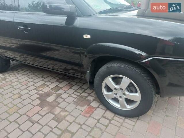 Хендай Туксон, объемом двигателя 2 л и пробегом 194 тыс. км за 6800 $, фото 13 на Automoto.ua