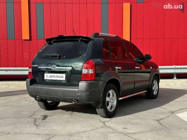 Хендай Туксон, объемом двигателя 2 л и пробегом 214 тыс. км за 7490 $, фото 7 на Automoto.ua