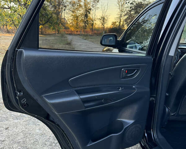 Хендай Туксон, объемом двигателя 2 л и пробегом 245 тыс. км за 7900 $, фото 36 на Automoto.ua