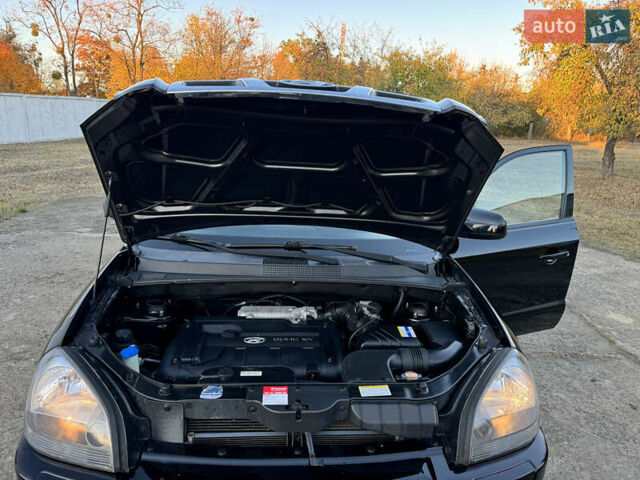 Хендай Туксон, объемом двигателя 2 л и пробегом 245 тыс. км за 7900 $, фото 46 на Automoto.ua