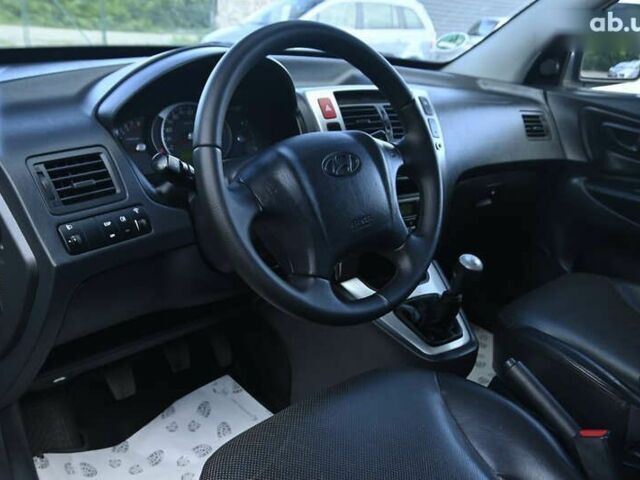 Хендай Туксон, об'ємом двигуна 2 л та пробігом 201 тис. км за 8300 $, фото 13 на Automoto.ua