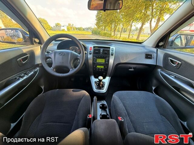 Хендай Туксон, об'ємом двигуна 2 л та пробігом 168 тис. км за 7500 $, фото 5 на Automoto.ua